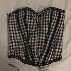 Black and white corset. Adjustable tightness.